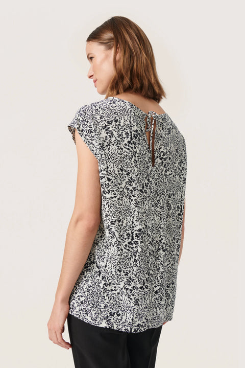 Soaked In Luxury Zaya Top In Black And White Ditsy Print